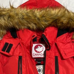 Canadian Weather gear warm winter coat. Fits like a large. Only worn one time.